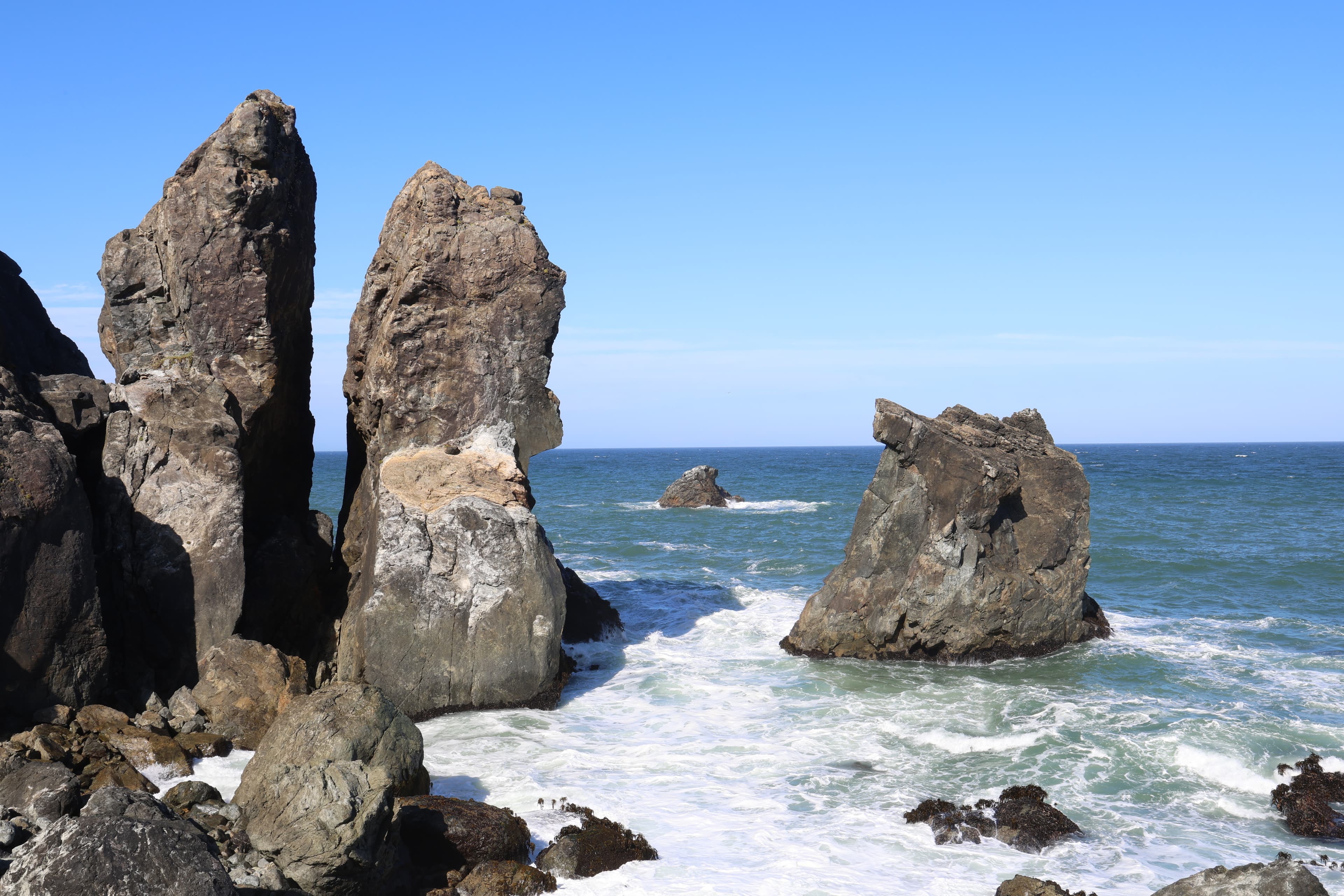 Tall rocks in water